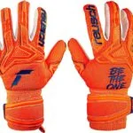 reusch guantes de portero pure contact gold junior con excelente agarre y corte interior juventud unisex 6